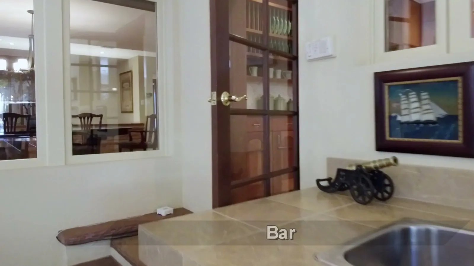 The built-in bar, an expression of the house’s hospitality role.