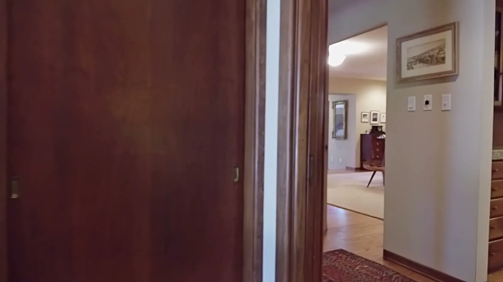 A paneled interior passage in the main house.