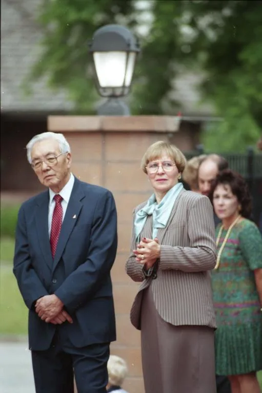 Bill Hosokawa and Leona Stoecker await the imperial party.